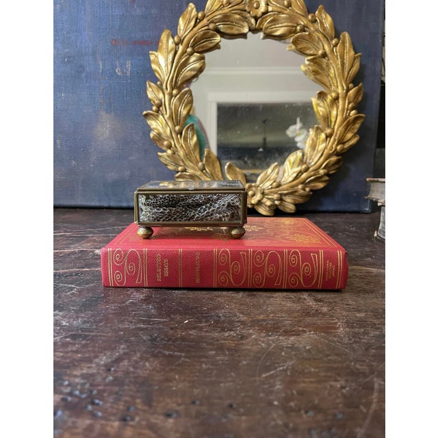 Wonderful vintage book from 1950s with fine binding in a red leather with gold design down the spine and across the front...