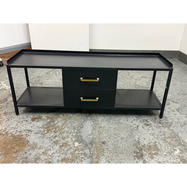 Design Plus Gallery presents an Industrial Metal Entry Bench. The bench has a black metal frame with a tray-style top,...
