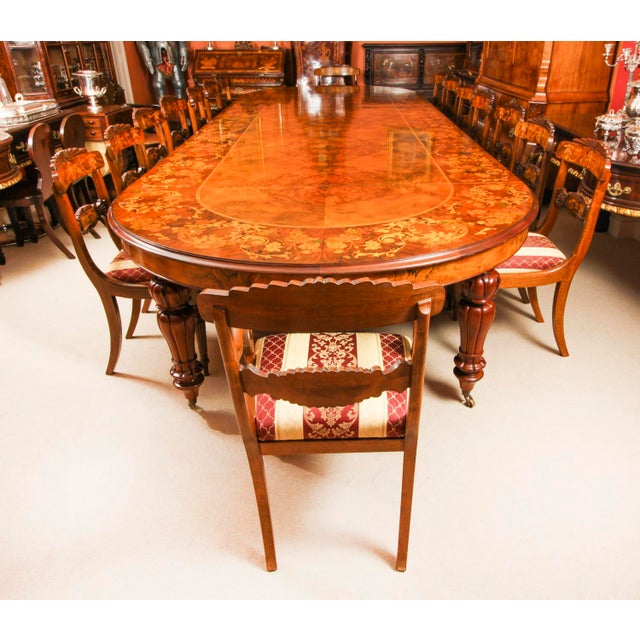 This is a fantastic vintage Victorian-style marquetry dining set, comprising a gorgeous burr walnut and marquetry dining...