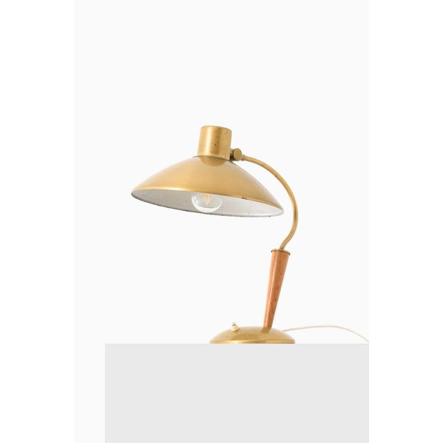 This table lamp, produced in sweden by an unknown designer, exemplifies the understated elegance and material balance...