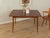 A wonderful butterfly dining table from the 1960s. Solid frame and veneered tabletop with solid teak edges. Quality...