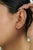 These stud earrings feature 0.57 carats of natural heart-cut rubies, set in 14K white gold. Each ruby measuring...