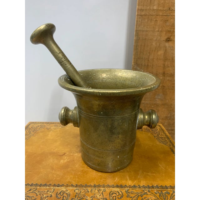 19th Century French Bronze Mortar with Original Pestle Bowl = 6.5” Diameter With Handles = 7” Diameter Pestle = 9.5”L x...
