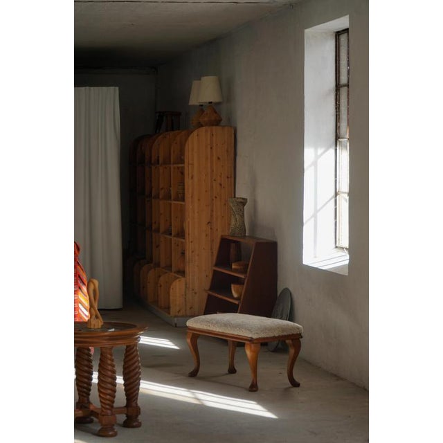 An elegant Rococo-style bench crafted in the early 20th century, distinguished by its graceful cabriole legs and refined...