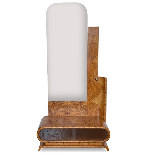 Art Deco dressing table dating from the 1930s. Crafted in beautifully figured walnut burl veneer, it features graceful...