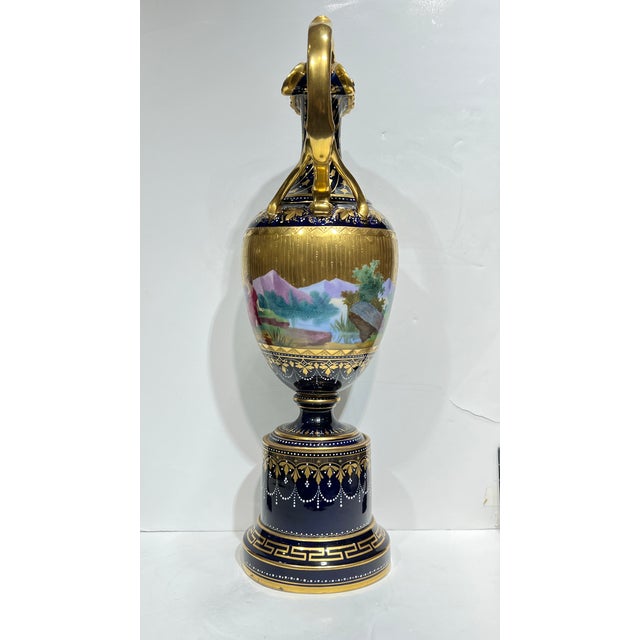 Antique (late 19th century) Austrian porcelain claret ewer on stand in the Greco-Roman neoclassical style with hand-...