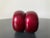A beautiful set of two (2) napkin ring holders in lacquer red burgundy, circa late-20th century. Rings depict round shape...