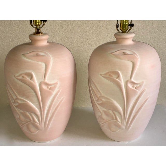 Calla lilies in pink, an iconic 1980's style. Lamps are in excellent condition with only minor evidence of prior use....