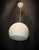 This vintage 60's enamel metal hanging lamp is a charming piece from the mid-20th century. With its classic design and...