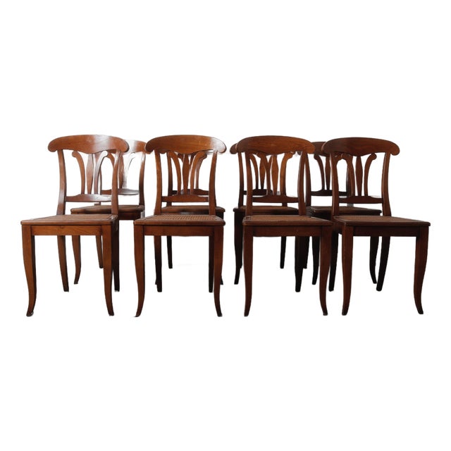 Late 20th Century Set of Eight Neoclassical Style Cherry Dining Chairs With Cane Seats and Saber Legs For Sale
