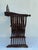 beautifully sculptural Savonarola side chair . 18” seat height . 36” h by 24” wide at arms .