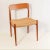 The model 75 by nils o. Möller was designed in 1954 and is one of this designer's most successful chairs. The version with...