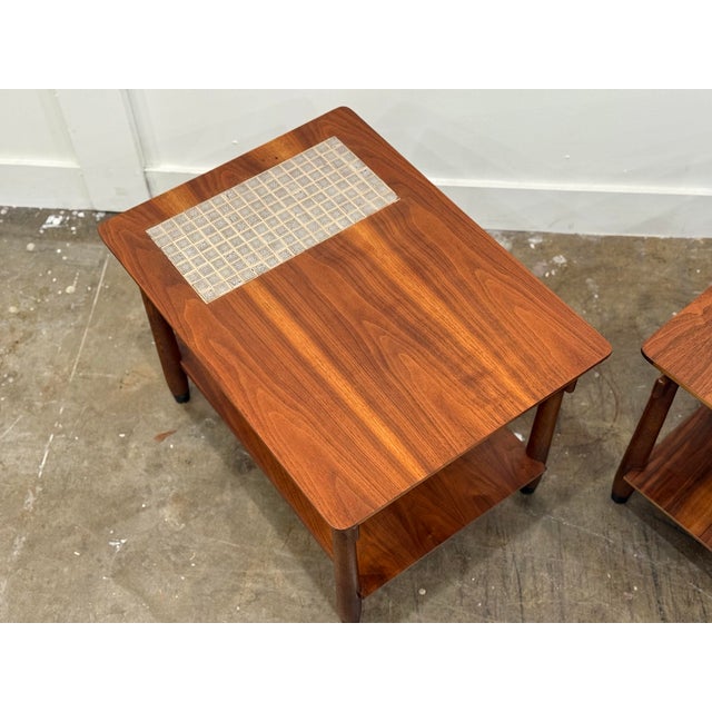 PAIR of Lane "Monte Carlo" side or end tables, circa 1960s. American black walnut and warm gray ceramic mosaic tile....