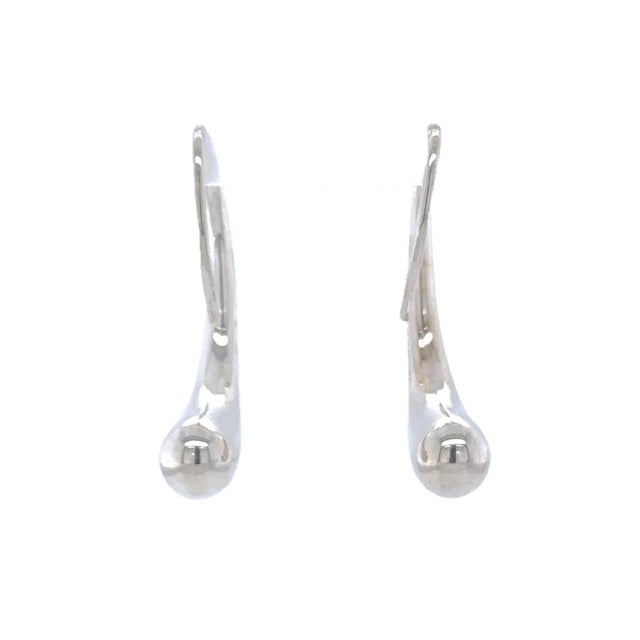 A rare pair of Tiffany & Co. Elsa Peretti Teardrop hoop earrings crafted in sterling silver, featuring the designer's...