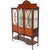 Superb Sheraton Revival mahogany display cabinet with elegant proportions and exquisite decorative detailing Raised on...