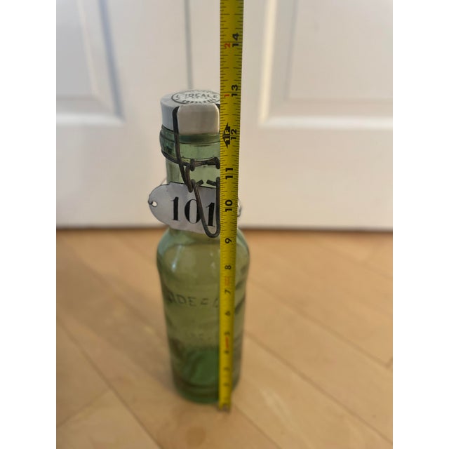 French Antique l'Ideale Bottle With Porcelain Top For Sale - Image 10 of 12