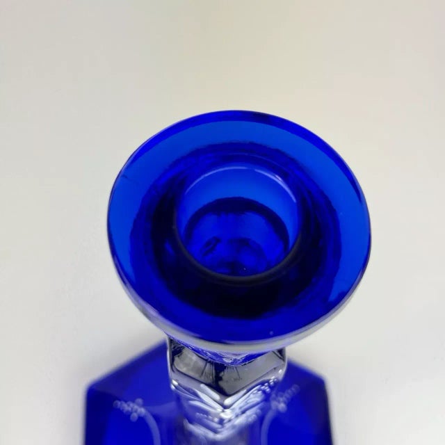 Enhance your décor with this stunning pair of Fenton Glass candlesticks in rich cobalt blue. Each piece is beautifully...