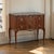 Graceful and beautifully detailed, this French Louis XVI style commode reflects the refined decorative tradition that...