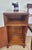 This is a gorgeous mid 20th-century Walnut bedside cabinet that exudes a timeless charm, perfect for adding a touch of...