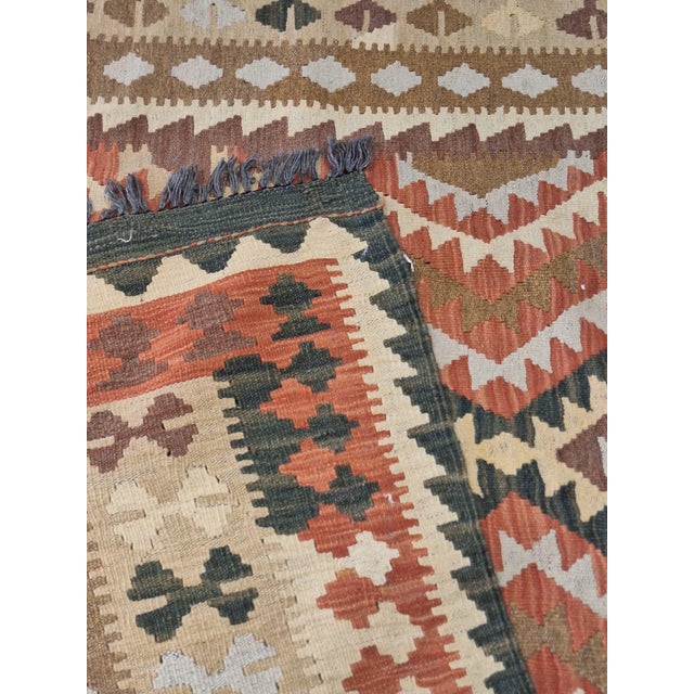 Vintage Handwoven Kilim Rug – 5’7” X 8’5” | Geometric Tribal Design | Earth-Tone Wool Flatweave For Sale - Image 4 of 5