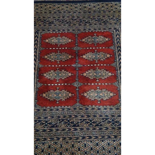 We offer this square decorative rug in oriental style with refined patterns in mainly red and blue colors, measuring...