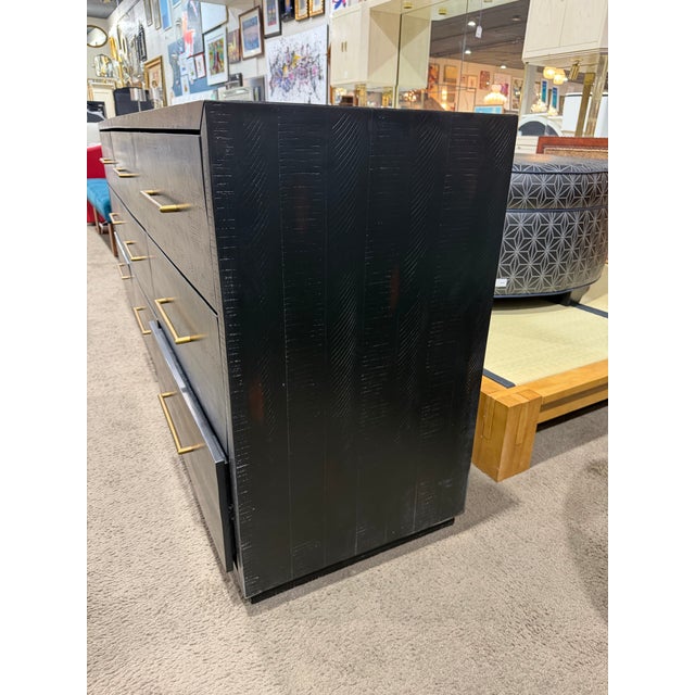 Sleek, substantial, and effortlessly modern, this Four Hands “Suki” dresser makes a bold statement through clean lines and...