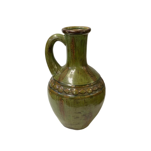 Discover timeless elegance with our Brown Olive Green Ceramic Clean Pattern Jar Shape Vase. This vase showcases a...