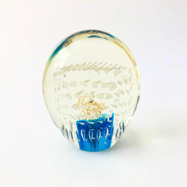 A beautiful vintage art glass featuring a variety of techniques and controlled bubbles to create a unique design.