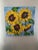 hey great impressionistic, painting of sunflowers done and bold colors with intense brushstrokes overall a great painting