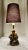 This Vintage Monkey Wearing Fez Accent Lamp with a green shade is a delightful piece manufactured by CBK in 1999. The...