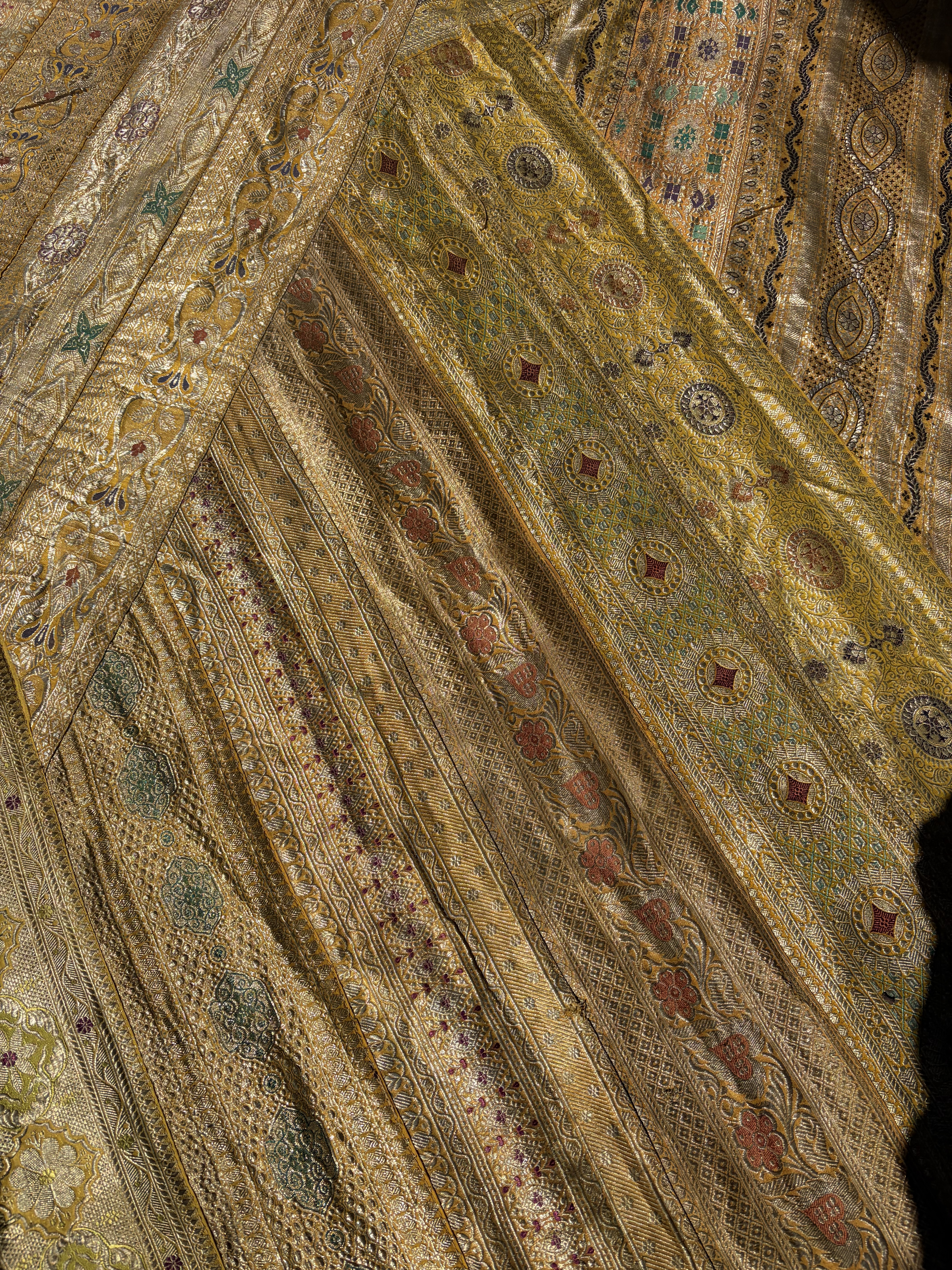 Maker: Unknown Origin: India Date: Mid-to-late 20th century (circa 1960s–1980s) Materials: Metallic brocade textile (gold-...