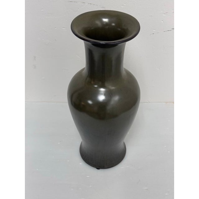 Design Plus Gallery presents a Tea Dust Glazed Vase from Martino Interiors. The ceramic vase has rounded shoulders, an...