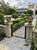Pair of Vintage Cast Stone Winged Gargoyle Statues For Sale - Image 11 of 11