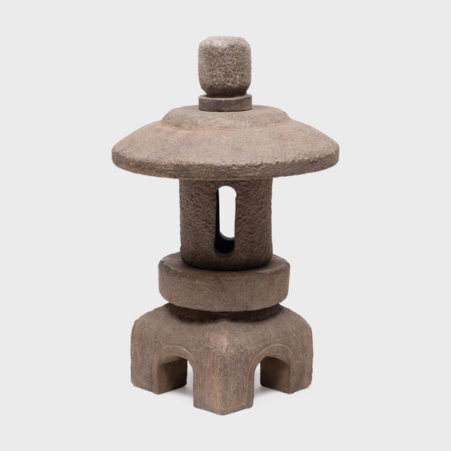 In the spirit of the traditional Chinese garden design, this miniature stacking lantern brings the permanence of stone to...