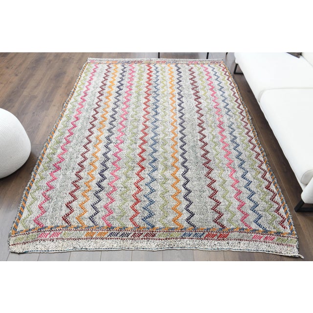 Vintage Turkish Hand-Knotted vintage rug is a semi-antique vintage area rug.'70s Eastern region of Turkey's unique rug is...