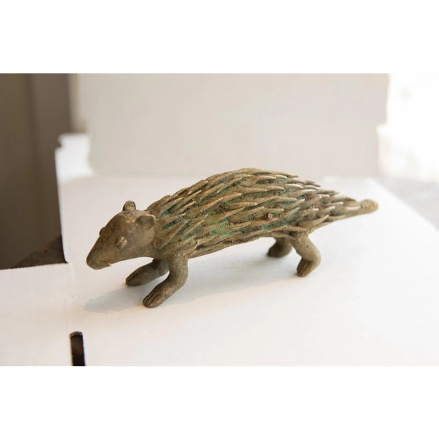 :: Vintage handmade African porcupine sculpture. Circa late mid 20th century, though possibly older, this piece has such...