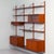 Royal system poul cadovius 17-piece modular danish wall unit in teak from the 1960s, with a light and open appearance. The...