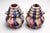 This pair of ceramic vases by Elgé powerfully illustrates the expressive and colorful aesthetic of mid-20th-century French...