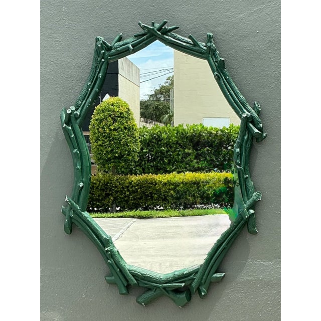 This vintage twig-style wall mirror is a striking blend of rustic charm and imaginative craftsmanship. Expertly fashioned...