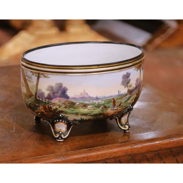 This elegant antique French jardinière, crafted in the Porcelaine de Paris tradition and dating to the late 19th century,...