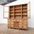 Antique pine sideboard, composed of two separable sections for easy transport and installation. The lower section features...