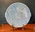 Magnificent large dish or bowl resting on a light pedestal in blue jasper enamelled ceramic by the famous ceramic artist...