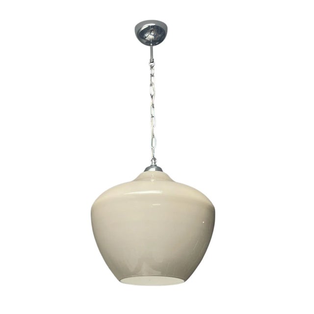 A refined pair of Italian Murano glass pendants, each featuring a large onion-shaped hand-blown glass shade in a subtle...