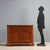 Walnut sideboard from the first half of the 20th century, originating from Italy, featuring a slight scalloping that adds...