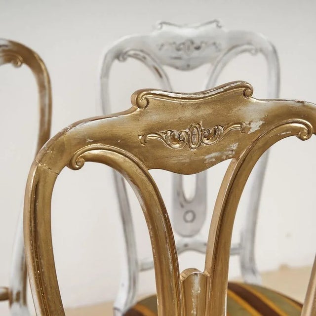 Height chairs: 103 Width: 47 Depths: 44 Setting height: 46 This piece is attributed to the mentioned designer/maker. It...