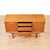 This elegant mid-century teak credenza by Jentique Furniture showcases the refined craftsmanship and clean lines that made...
