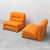 Pair of armchairs or a 2-seater modular sofa made in the 1970s. Upholstered in orange fabric. Excellent condition, as...