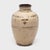 This richly glazed Chinese vase was shaped by hand in the mid-19th century, originally used to store wine and spirits made...