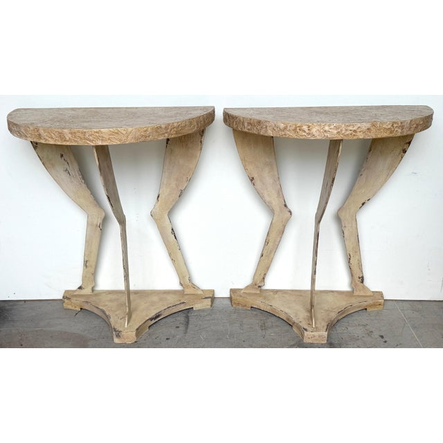 Pair of John Dickinson Style Faux Bois Demilune Consoles, American, Late 20th Century Striking pair of sculptural demilune...
