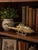 Bring vintage aviation charm to your home with this solid brass helicopter sculpture. Featuring detailed engraved panel...